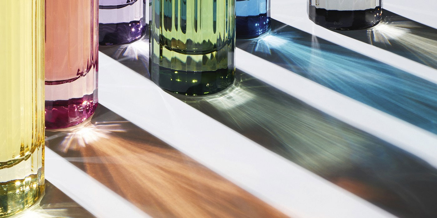 Herrera Confidential Eaux de Toilette bottles and light