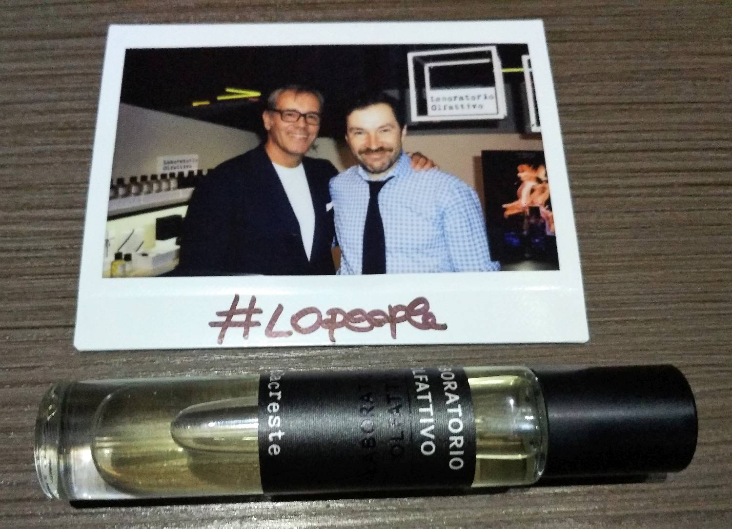 perfume sample and photo of Sergey Borisov and Roberto Drago