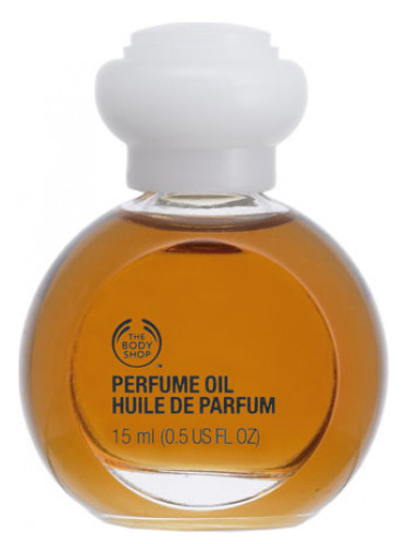 Verbinding verbroken Nodig uit brandwonden Woody Sandalwood Perfume Oil The Body Shop parfum - een geur voor dames en  heren
